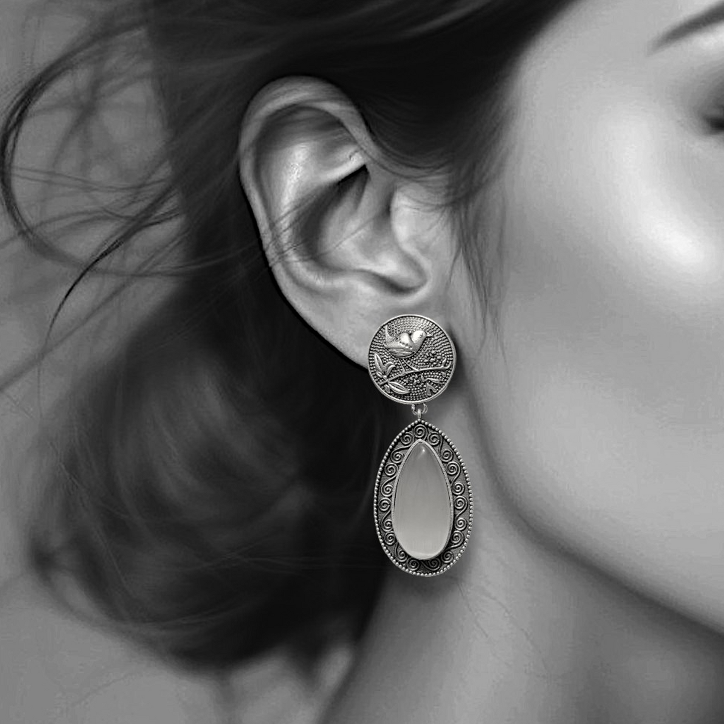 Sleek Silver Bird Drops
