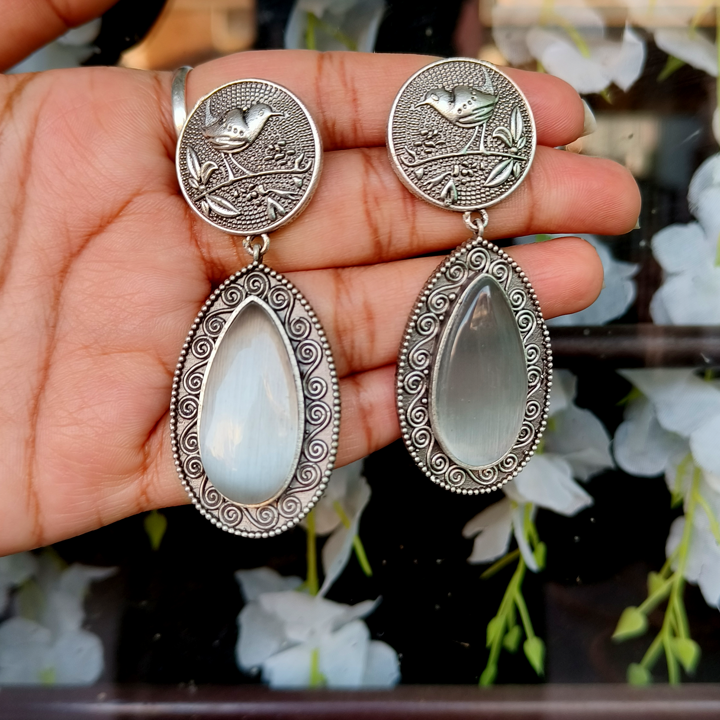 Sleek Silver Bird Drops